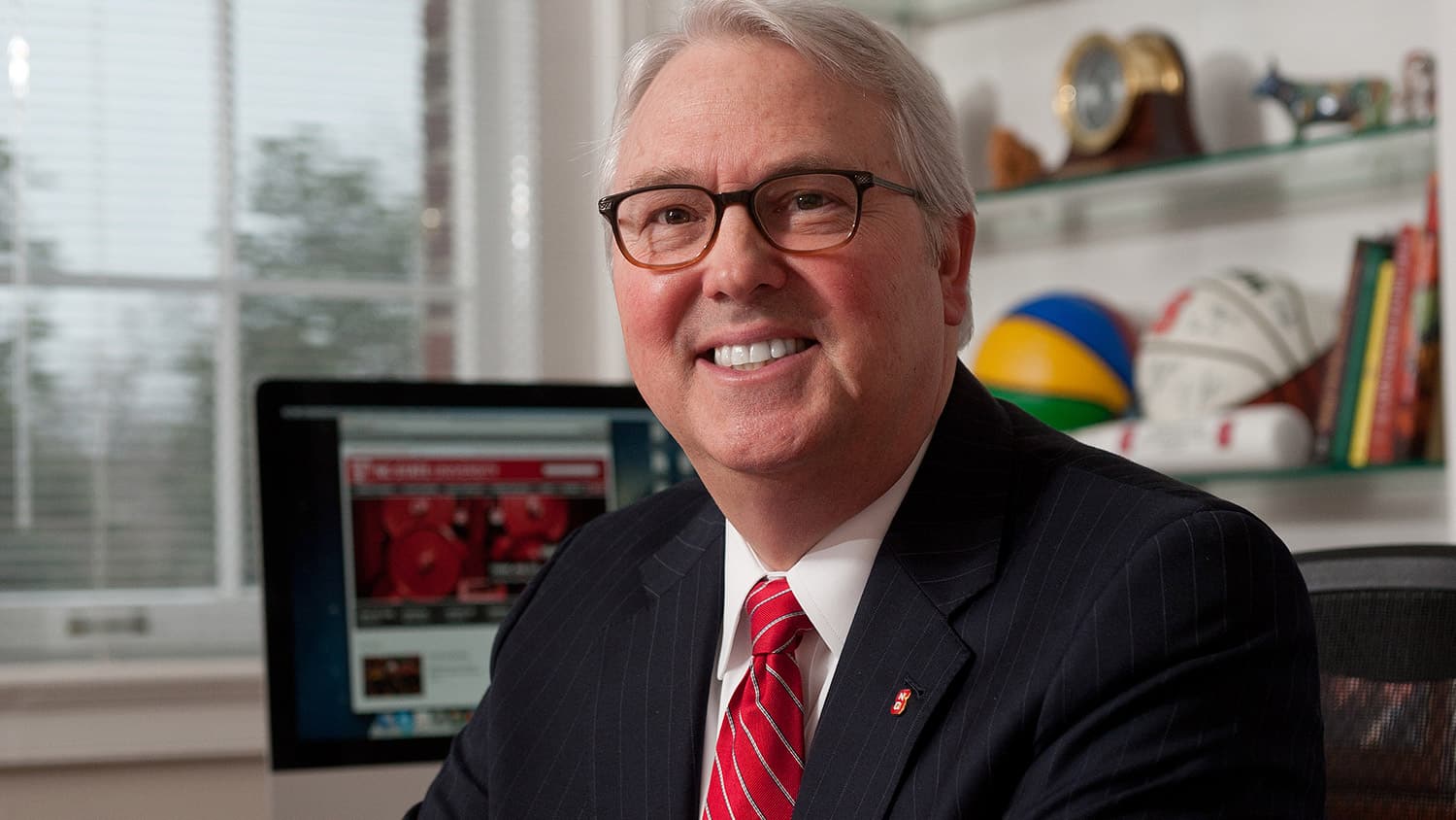 NC State Chancellor Woodson at his desk in Holladay Hall.