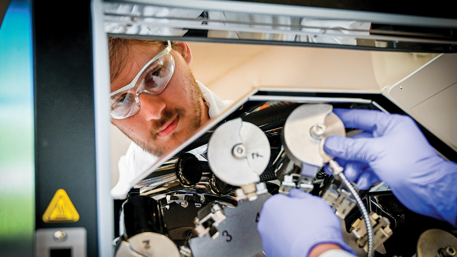 A Polymer and Color Chemistry student works in the lab.