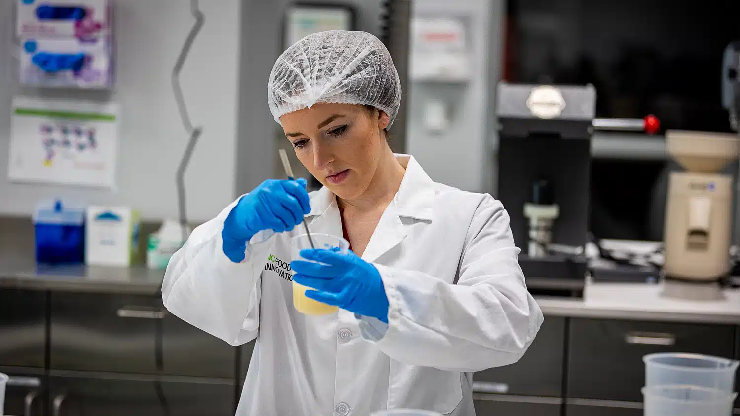 Food scientist Chloe Brubaker with the North Carolina Food Innovation Lab hydrates a protein for use in a food formulation.